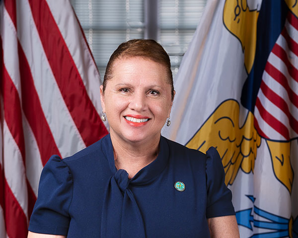 Commissioner Justa Encarnacion